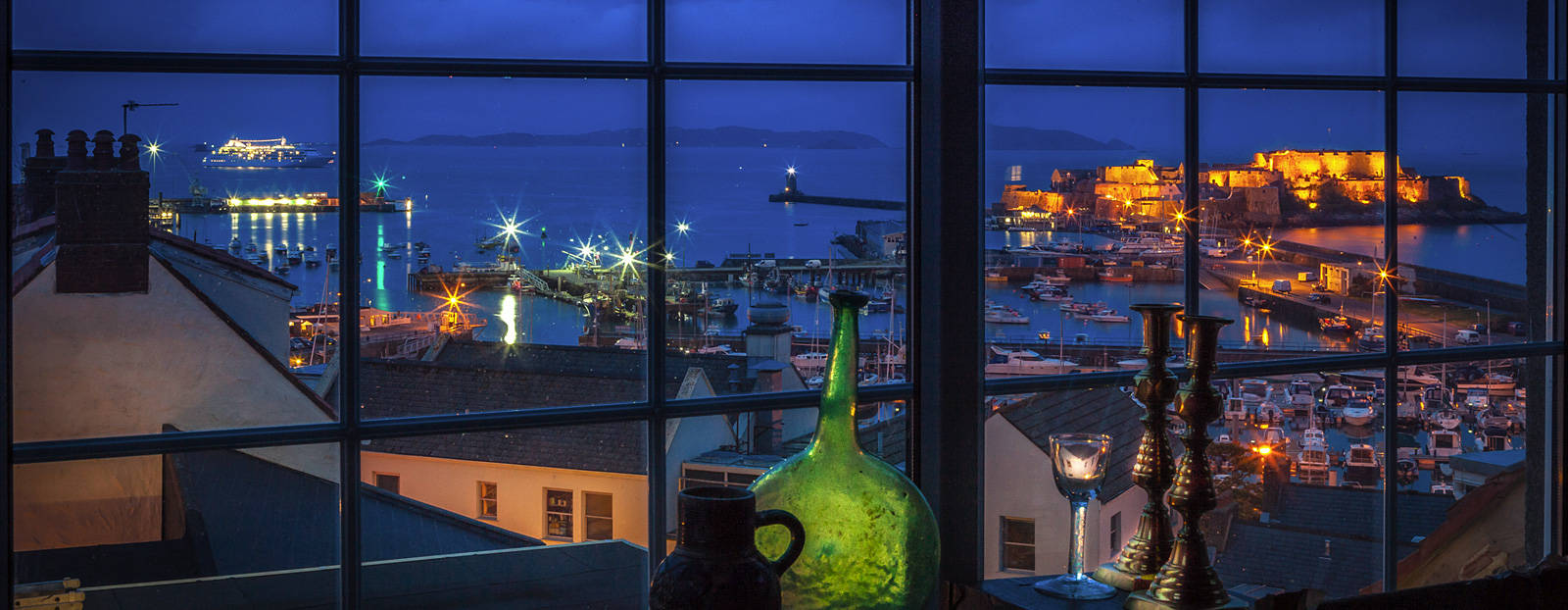 Window view over St. Peter Port harbour